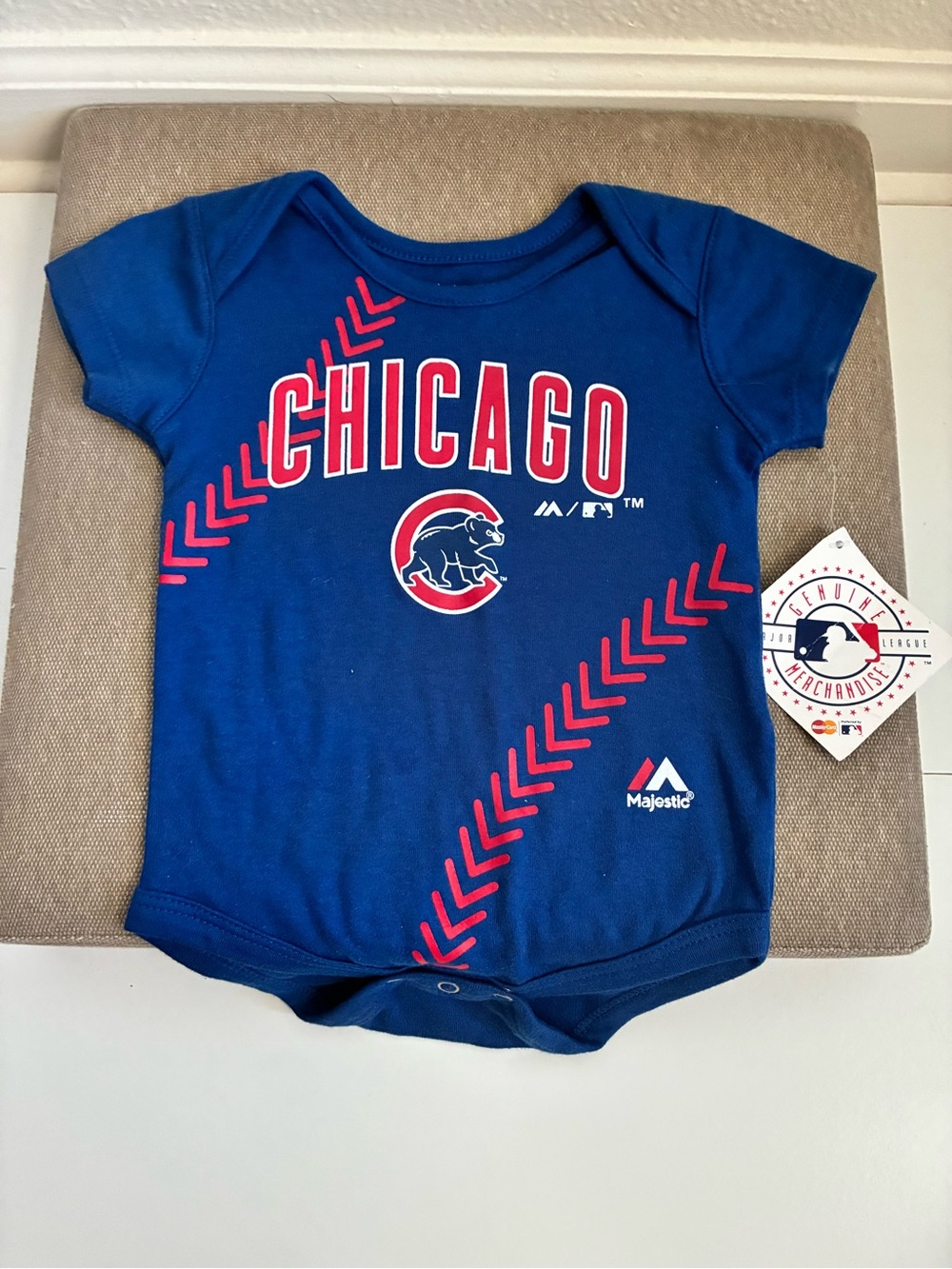 Majestic Royal Blue Chicago Cubs Baby Onesie with Red Baseball Accents